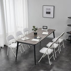 Chaises élégantes pliables en fer et PVC blanc pour congrès et expositions