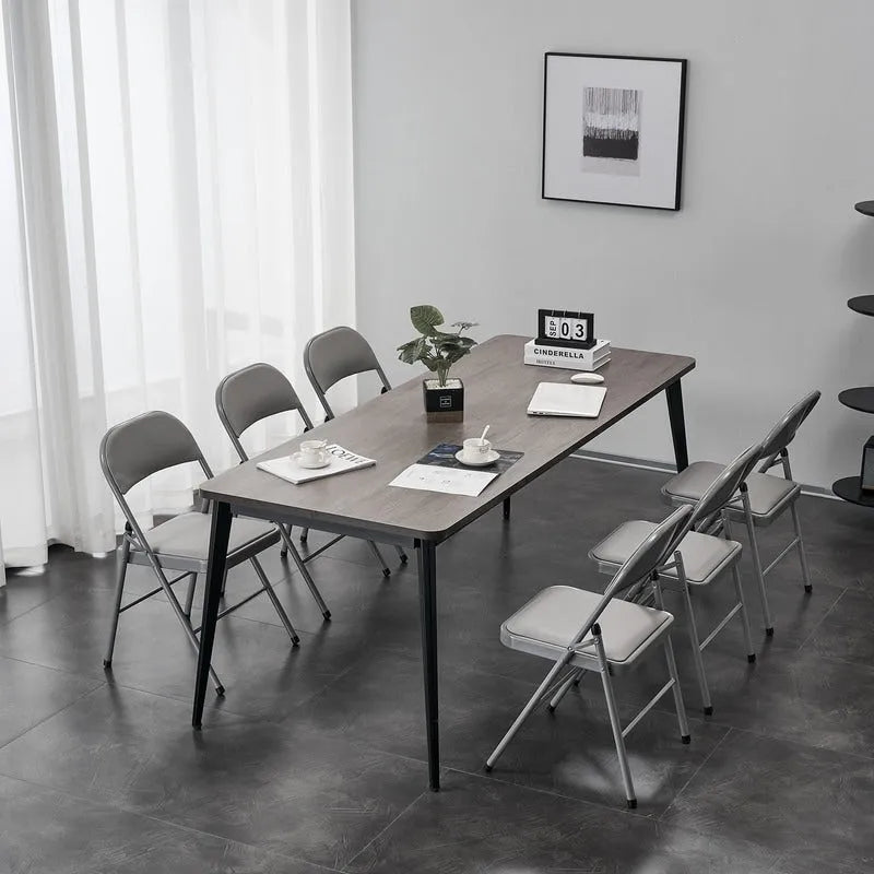 Chaises élégantes pliables en fer et PVC blanc pour congrès et expositions