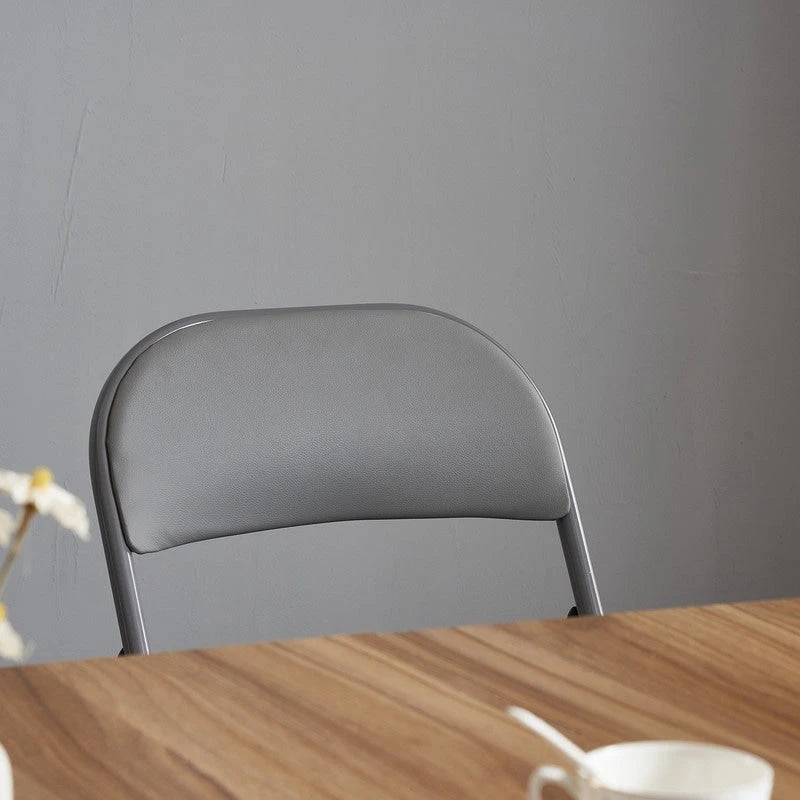 Chaises élégantes pliables en fer et PVC blanc pour congrès et expositions